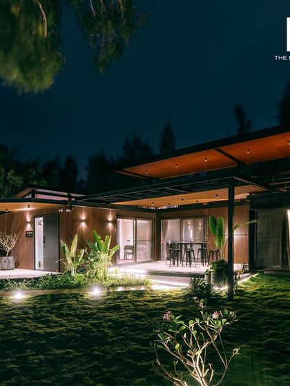 The 2BHK cargo home at night, with warm lighting creating an inviting and cozy atmosphere.