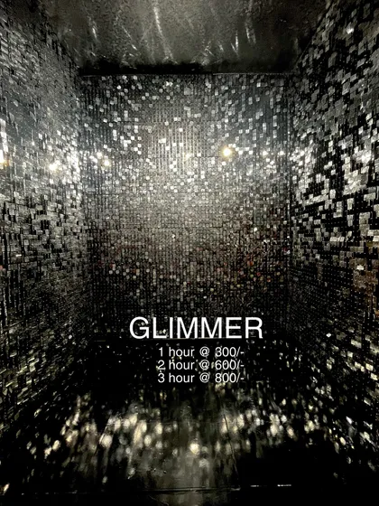 Here's a closer look at the 'Glimmer' Reel Booth in Jayanagar. This space is available for hourly rental, giving you an instant, high-impact set for your next video shoot.