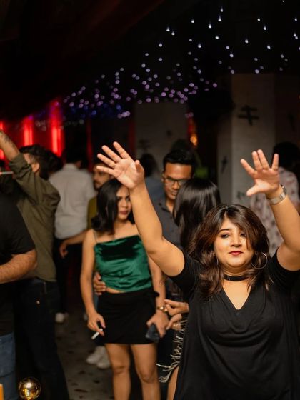 Hands in the air. The crowd is feeling the music and letting go.