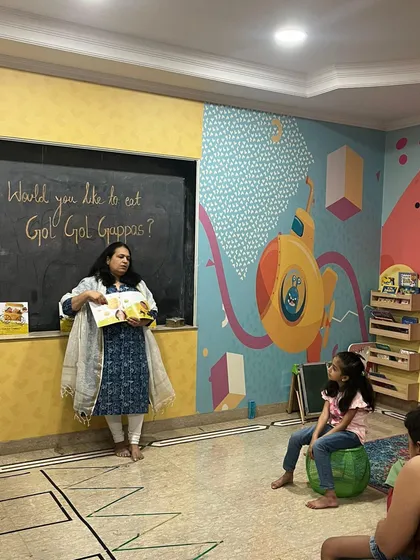 "Would you like to eat Gol Gol Guppas?" Story time is always interactive and full of energy. I use stories to introduce kids to new ideas, from traditional foods to cultural tales, making learning an adventure.