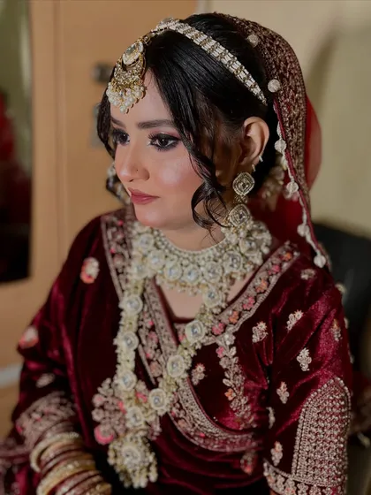 The final look with the dupatta set. The bride looks absolutely radiant and ready for her big day.