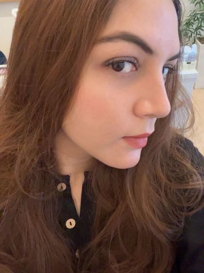 A front facing view of a subtle and lightweight classic lash application. This style is perfect for enhancing your everyday look without appearing overdone.