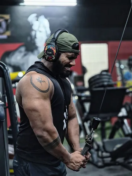 The strain of the last few reps on the triceps pushdown. This is where the muscle grows. Pushing through the pain is what separates the good from the great.