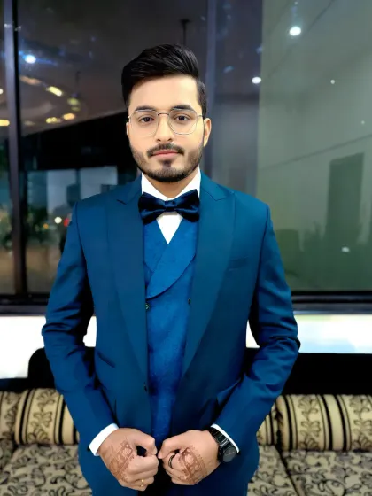 Another angle of this dashing groom. The makeup is designed to look great under any lighting, ensuring he appears fresh and confident throughout his Roka ceremony.