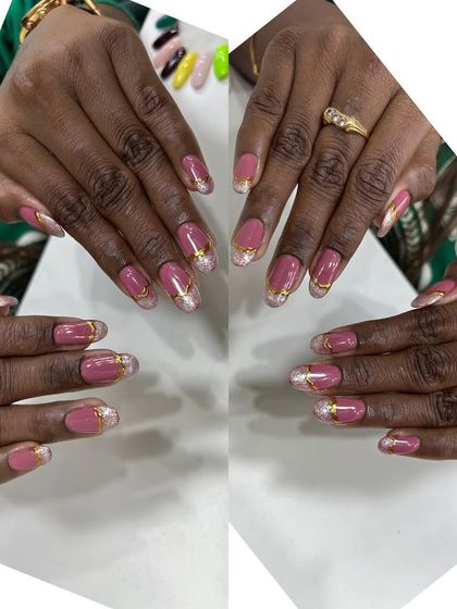 An elegant design featuring dusty rose nails with a delicate gold and glitter border. This adds a touch of intricate detail to a classic color.