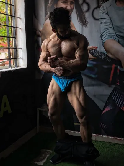 A most muscular pose, showcasing the results of peak week. This is the conditioning and fullness we aim for right before stepping on stage.