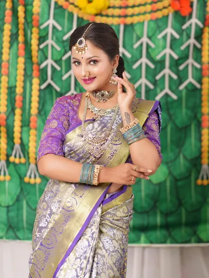 A different angle of the same bride, showing how the jewellery complements her beautiful hairstyle.