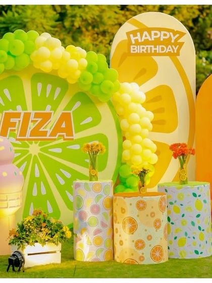 The complete 'Two-tti Fruity' backdrop, including a cute ice cream cone prop to complement the fruity theme.