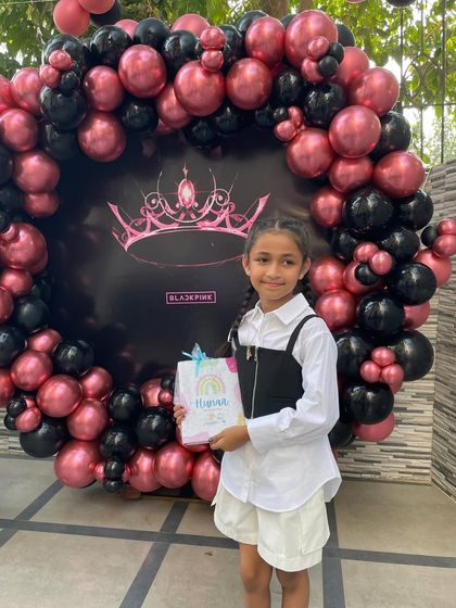 The birthday star at her Blackpink themed party. Seeing smiles like this is what makes my job the absolute best. We love creating unforgettable experiences for your little ones.
