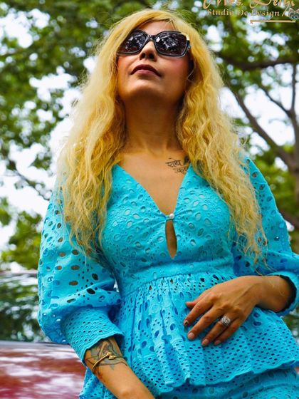 A close-up of the sky-blue chikankari peplum top. The delicate fabric and flattering cut make it a standout piece for any wardrobe.