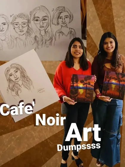 This image shows a group caricature I did, alongside some of the beautiful paintings from a workshop. It was a day full of creativity.
