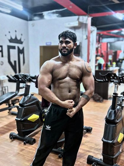 A side chest pose, showing the progress in my bulk. The goal is to add size while maintaining some definition.