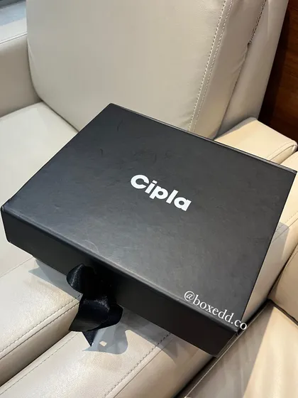 The sleek, custom-branded box for the Cipla New Year gifts. The minimalist design with the company logo is professional and elegant.