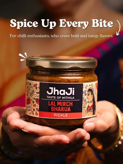 Our Lal Mirch Bharua is for those who crave bold, tangy, and spicy flavours. We hand-stuff seasonal Banarasi red chillies with a special blend of roasted masalas. It's a pickle that adds a fiery punch to any meal, perfect with dal-chawal, roti, or parathas.