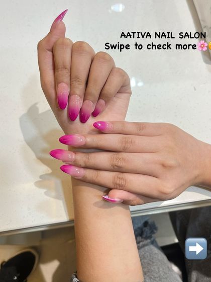 Another look at our eye-catching hot pink ombré nails, a favorite for clients who love a pop of color.