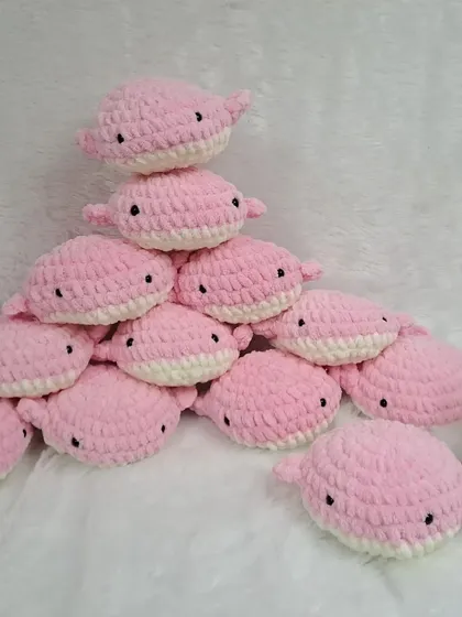 For a pop of color, I make these whale plushies in bright pink. They are soft, squishy, and loved by kids.