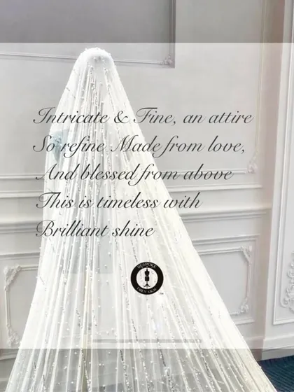 A full view of an ethereal bridal veil, showcasing its brilliant shine and the fine, intricate craftsmanship.