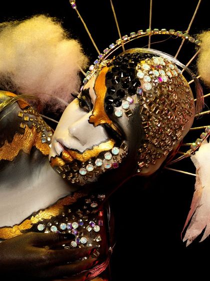 A fantasy portrait created by one of my talented students. The look is inspired by a butterfly, using textured elements, gold leaf, and dramatic lighting to create a magical effect.