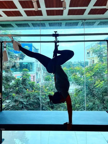 Every day is an opportunity to discover how beautiful you are. This handstand variation on the Cadillac is a powerful expression of that beauty.