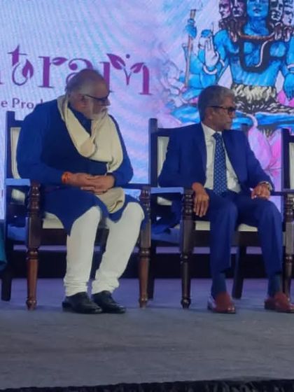 Pt. Jai Kishan Maharaj as a guest of honor at an event by REVA University, seated alongside other esteemed artists.