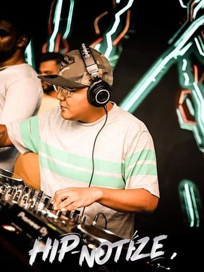 A shot from a 'Hip-notize' event. My goal is to get the crowd locked into the groove with a hypnotic blend of beats.