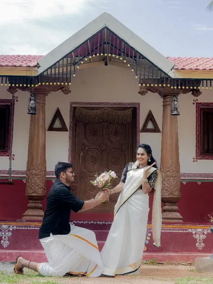 A classic proposal moment recreated during a pre-wedding shoot at a traditional South Indian village set. So romantic.
