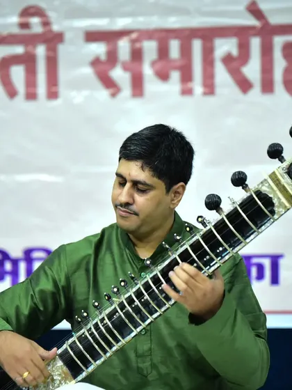 Lost in the melody during a performance at the Pandit Vishnu Krishna Joshi Jayanti Samaroh in Raipur. This photo captures the focus and dedication I bring to every classical recital.