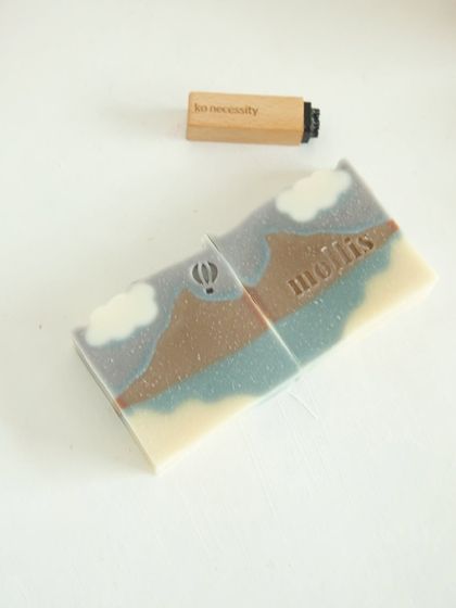 My 'Mountain Mist' soap, scented with orange and cedarwood and colored with botanicals like indigo and hibiscus.