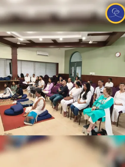 A wide view of our satsang, showing the mix of new and long-time members. All are welcome to join our circle of divine friendship and seek inner peace together.