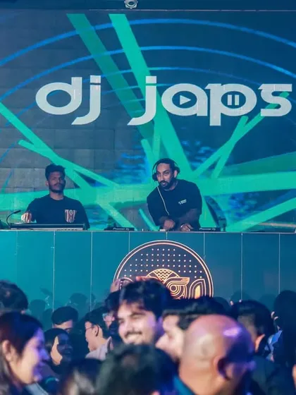 A wide shot of my setup at SOHO Goa. You can see the packed dance floor and the professional lighting that creates an immersive club experience.