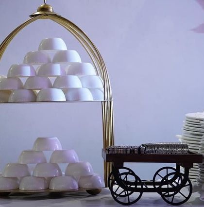 For a Lohri party, even the small details matter. This bowl and plate stand adds a touch of rustic elegance to the buffet line.