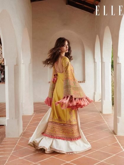 The movement in this shot for ELLE India is everything. The hair is styled to flow beautifully, and the makeup remains flawless and camera-ready.