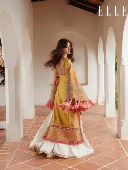 The movement in this shot is everything. The hair flows beautifully as Disha turns, showcasing a versatile style that looks amazing both still and in motion for this ELLE editorial.