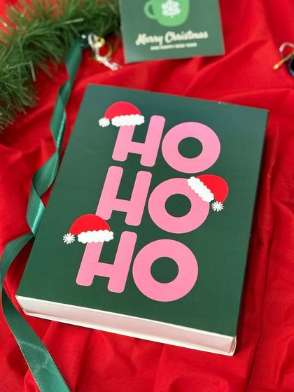 My "Ho Ho Ho" Christmas gift box is designed to bring a smile. The fun and festive packaging makes it a standout choice for personal or corporate holiday gifting.