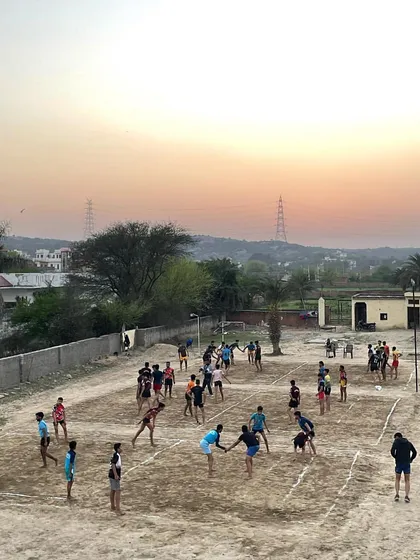 A beautiful sunset over our training ground as the players are busy with their evening practice. This is our home.