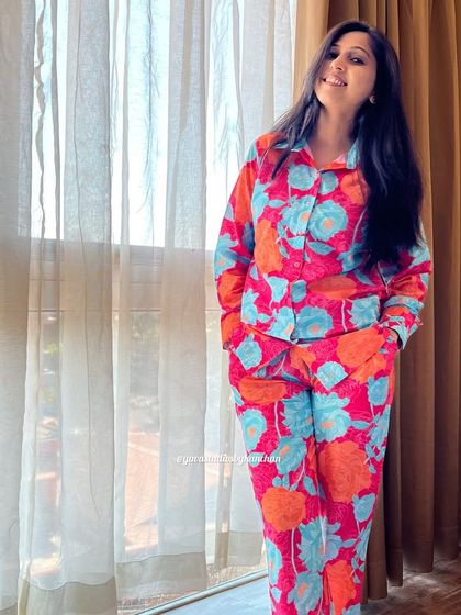 Another look at our vibrant floral muslin cotton co-ords. The pants have two pockets, and the entire set is designed for comfort and style.
