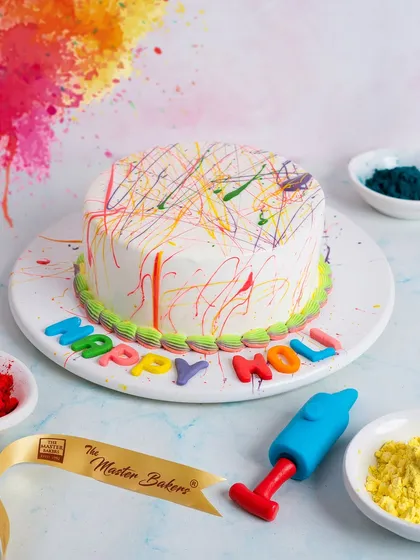 Celebrate Holi with a splash of color. This cake is decorated to look like it's been splashed with gulal, and even comes with a small fondant pichkari (water gun) for a playful touch.