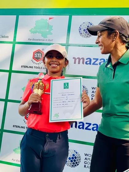 Another angle of Aahana Shrivastava being awarded her trophy for her podium finish at the Delhi-NCR Cup.