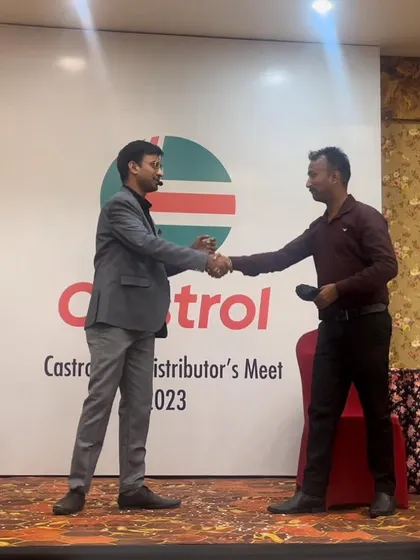 Shaking hands with a volunteer on stage. Audience participation is what makes the show special.
