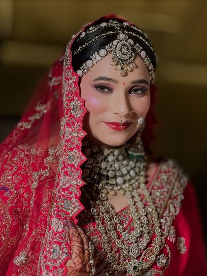 Another portrait of my royal bride, looking directly at the camera. Her confidence and the power of the makeup shine through.