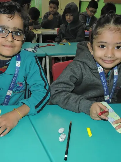 Students work on crafts to celebrate International Disability Day. These activities are designed to foster understanding, empathy, and respect for people with different abilities.