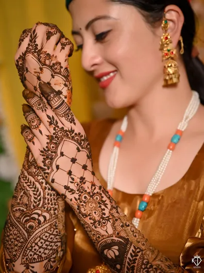 A detailed close-up of the intricate patterns of the bridal Mehandi.
