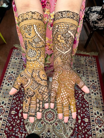 A beautiful non-bridal design with full coverage. The patterns are a mix of traditional Indian motifs, perfect for a wedding guest or family member.