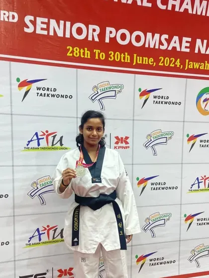 Vanshika Singhal showcasing her silver medal from the Junior National Taekwondo Championship 2024. A fantastic achievement on a national stage.