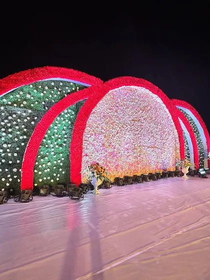 A side view of the grand floral stage, highlighting its impressive scale and the way it commands the space.