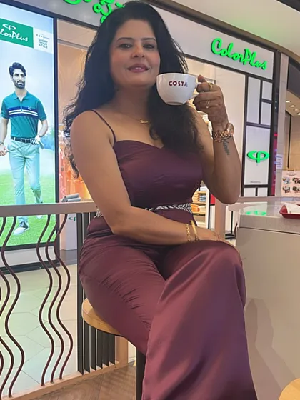 A well-fitted jumpsuit is a modern power outfit. I designed this wine-colored satin jumpsuit with a hand-embroidered belt for a beauty event, showing how to look polished and chic with minimal effort.