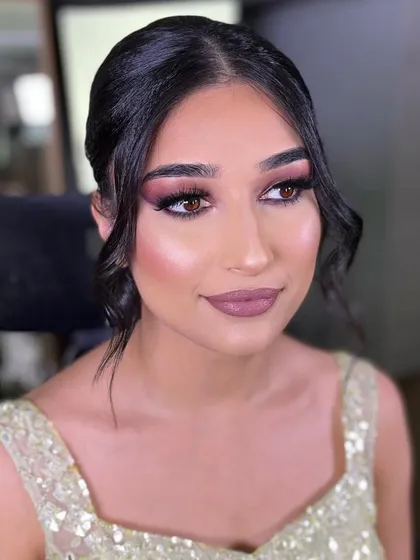 A beautiful, natural glam look perfect for a daytime engagement or Roka. I used earthy tones for the eyeshadow and a matte mauve lipstick to create a sophisticated and understated look.