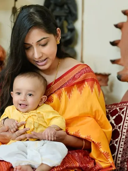 A beautiful portrait of me and my son during his Annaprashan ceremony.