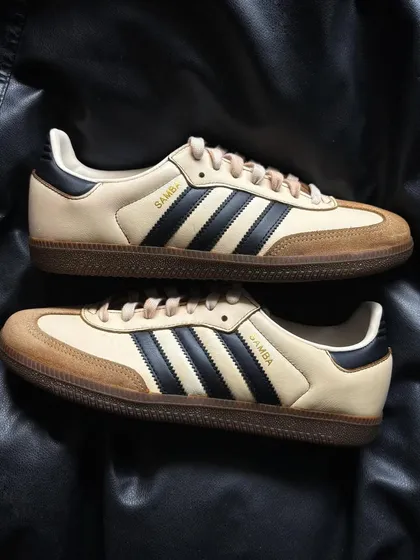A pair shot of the coffee custom Adidas Sambas.