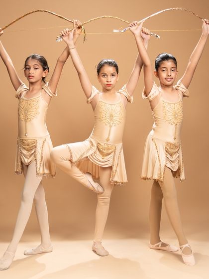 These studio portraits capture the warrior spirit of our dancers performing a piece inspired by the ballet 'Sylvia.' Holding their bows, they embody a story of conflict, courage, and resolution.